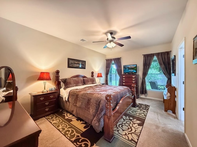 42273 Atmore Pl, Ponchatoula, LA 70454 - bedroom with ceiling fan, visible vents, light colored carpet, baseboards, and access to outside
