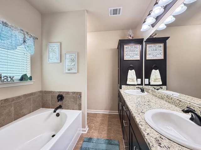 42273 Atmore Pl, Ponchatoula, LA 70454 - full bathroom with a sink, a garden tub, and visible vents