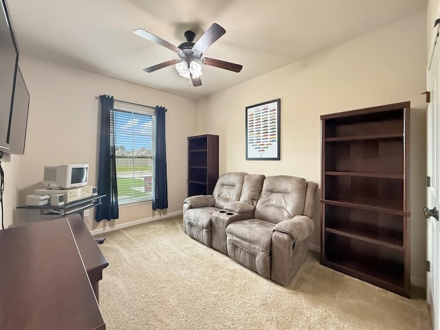 42273 Atmore Pl, Ponchatoula, LA 70454 - living area with light colored carpet, baseboards, and ceiling fan