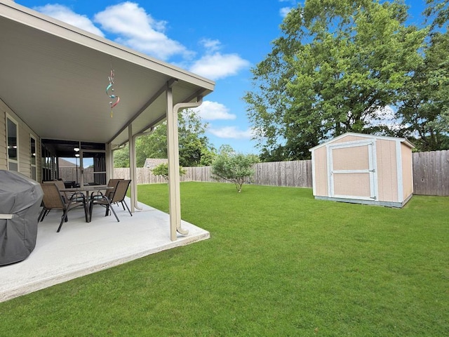 42273 Atmore Pl, Ponchatoula, LA 70454 - view of yard with a fenced backyard, an outbuilding, a patio area, and a shed