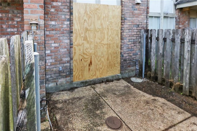 details with fence and brick siding