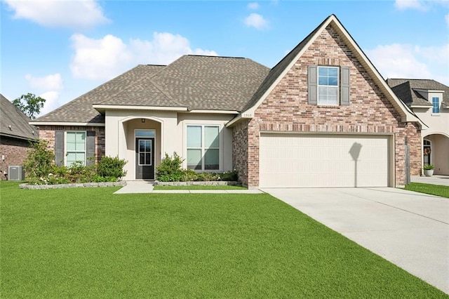 view of front of home with a front yard, central air condition unit, brick siding, concrete driveway, and a shingled roof