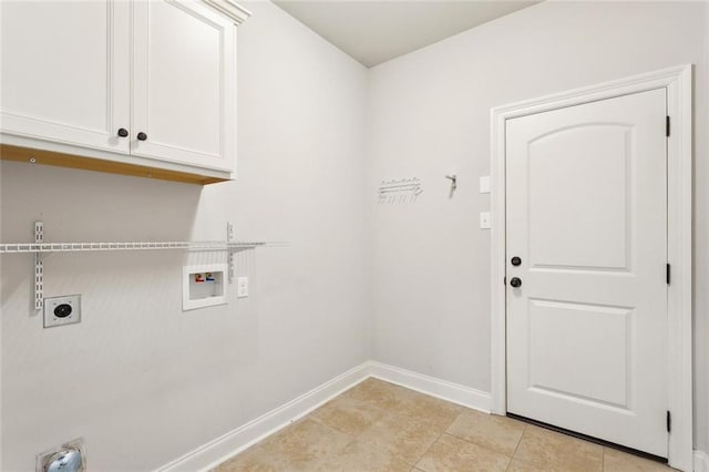 clothes washing area featuring baseboards, washer hookup, cabinet space, light tile patterned floors, and hookup for an electric dryer