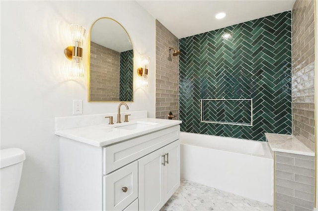 316 Claiborne Ct, Jefferson, LA 70121 - bathroom with recessed lighting, vanity, toilet, and tile walls