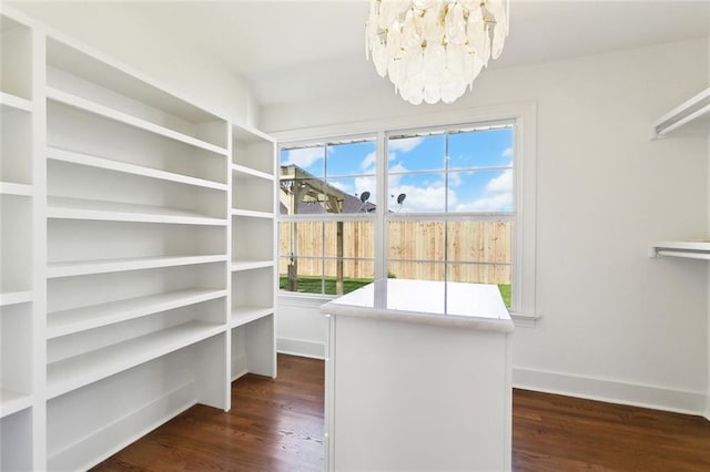 316 Claiborne Ct, Jefferson, LA 70121 - spacious closet featuring dark wood finished floors and a notable chandelier