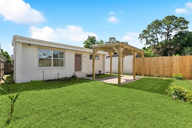 316 Claiborne Ct, Jefferson, LA 70121 - view of front of property with brick siding, a front yard, a fenced backyard, and entry steps