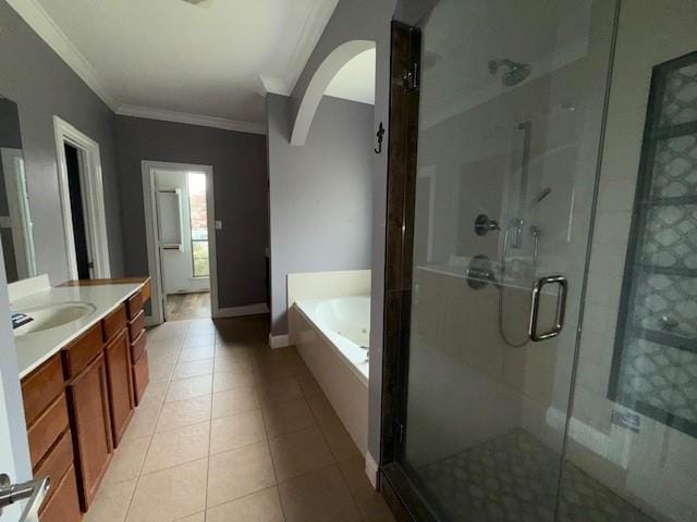 12742 Diamond Lake Dr, Walker, LA 70785 - bathroom with ornamental molding, a bath, a stall shower, tile patterned flooring, and vanity