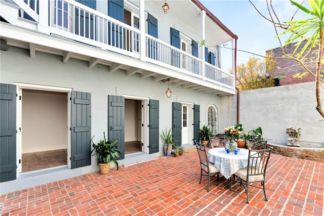 415 Burgundy St Unit 1B, New Orleans, LA 70112 - view of patio / terrace featuring a balcony and outdoor dining space