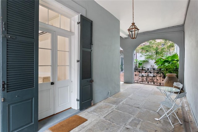 415 Burgundy St Unit 1B, New Orleans, LA 70112 - entrance to property featuring stucco siding