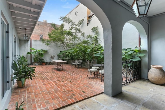 415 Burgundy St Unit 1B, New Orleans, LA 70112 - view of patio featuring outdoor dining area