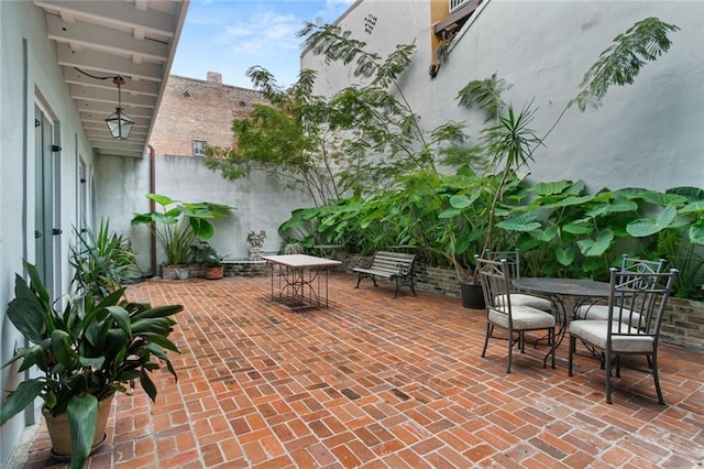 415 Burgundy St Unit 1B, New Orleans, LA 70112 - view of patio / terrace with outdoor dining space