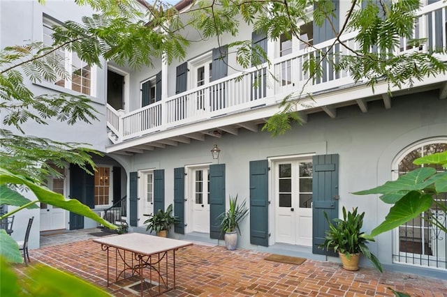 415 Burgundy St Unit 1B, New Orleans, LA 70112 - view of patio / terrace with a balcony