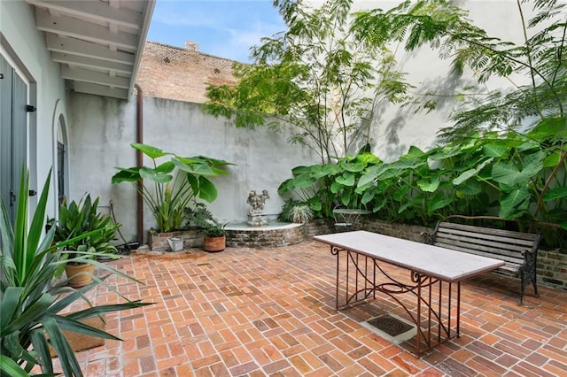 415 Burgundy St Unit 1B, New Orleans, LA 70112 - view of patio / terrace with outdoor dining area
