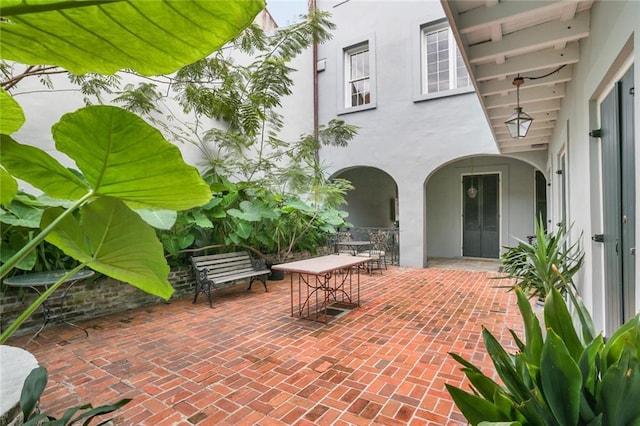 415 Burgundy St Unit 1B, New Orleans, LA 70112 - view of patio featuring outdoor dining space