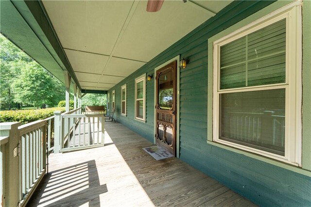 wooden deck featuring a porch