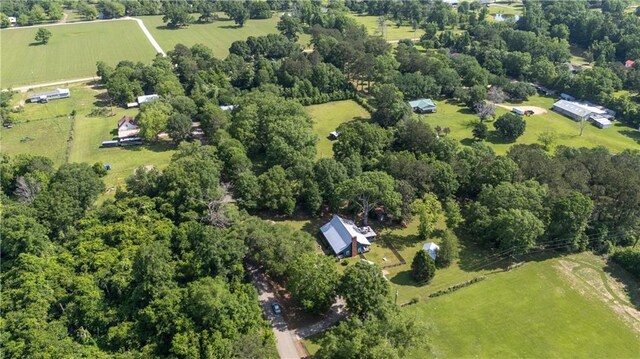 birds eye view of property with a rural view