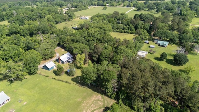 birds eye view of property with a rural view