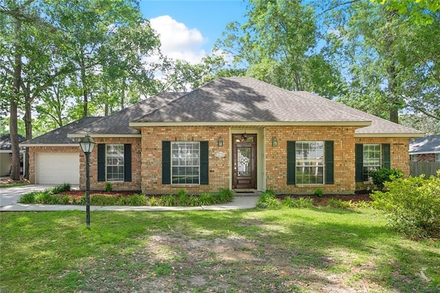 6024 Chateau Loire Cir, Mandeville, LA 70448 - ranch-style house with brick siding, roof with shingles, and a front lawn