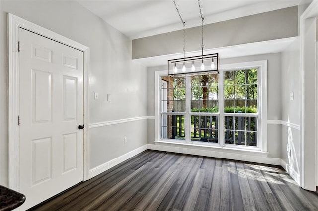 6024 Chateau Loire Cir, Mandeville, LA 70448 - unfurnished dining area featuring baseboards and dark wood finished floors