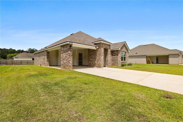 48345 Red Fox Dr, Hammond, LA 70401 - view of front facade featuring brick siding and concrete driveway