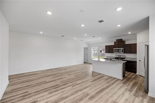 48345 Red Fox Dr, Hammond, LA 70401 - kitchen featuring stainless steel appliances, open floor plan, healthy amount of natural light, baseboards, and recessed lighting