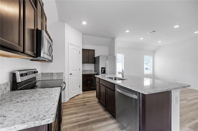 48345 Red Fox Dr, Hammond, LA 70401 - unfurnished room featuring healthy amount of natural light, wood finished floors, recessed lighting, and baseboards