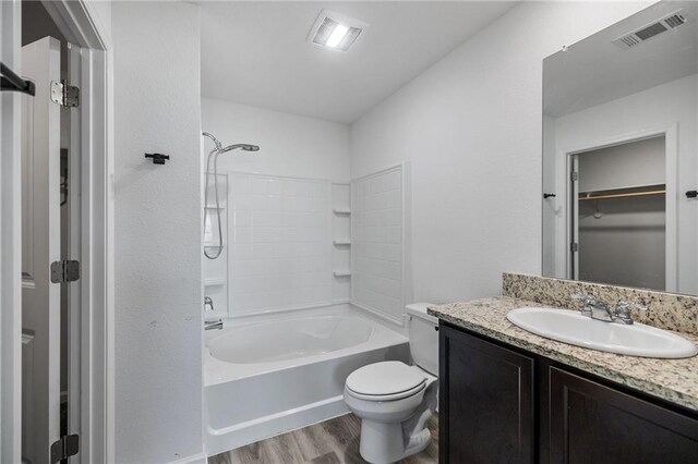 48345 Red Fox Dr, Hammond, LA 70401 - unfurnished bedroom with carpet floors, vaulted ceiling, multiple windows, baseboards, and connected bathroom