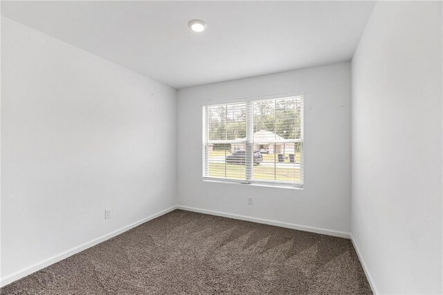 48345 Red Fox Dr, Hammond, LA 70401 - full bathroom featuring wood finished floors, toilet, vanity,  shower combination, and a walk in closet