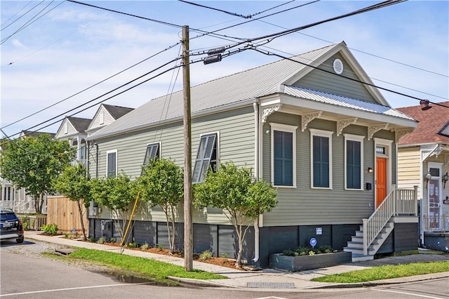 view of front of property featuring metal roof