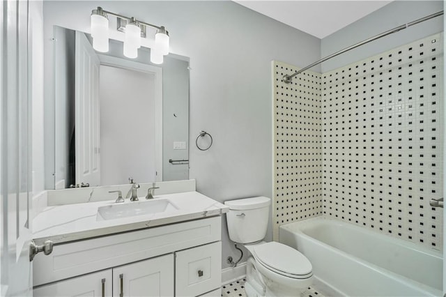 full bathroom featuring vanity, baseboards, washtub / shower combination, and toilet