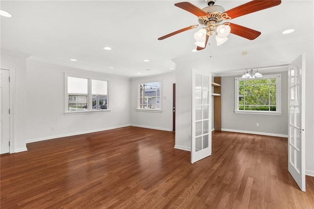 5652 General Haig St, New Orleans, LA 70124 - unfurnished living room featuring crown molding, french doors, recessed lighting, baseboards, and wood finished floors