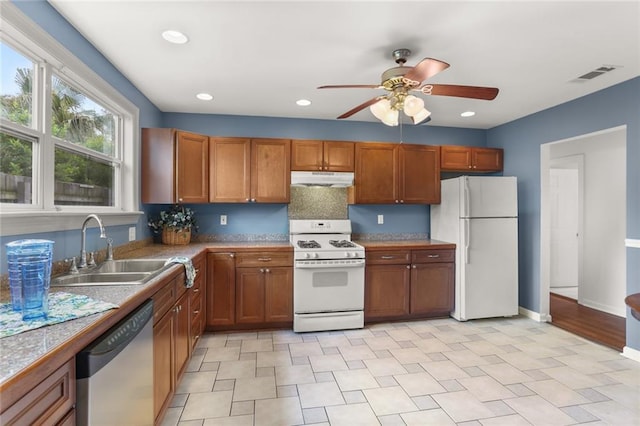 5652 General Haig St, New Orleans, LA 70124 - kitchen featuring ceiling fan, visible vents, a sink, under cabinet range hood, and white appliances
