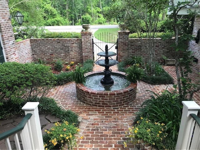 view of patio / terrace featuring fence
