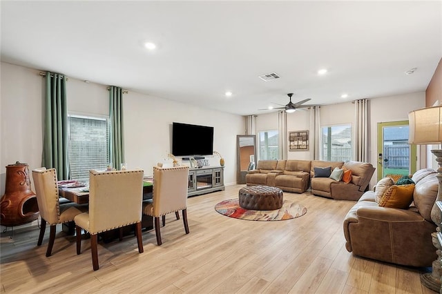 living area featuring visible vents, recessed lighting, light wood finished floors, and ceiling fan