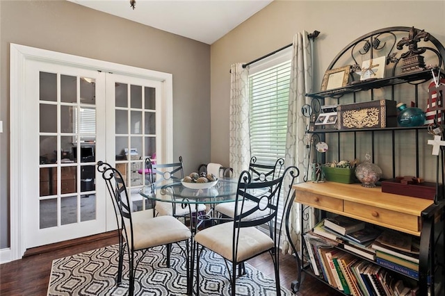 dining room with french doors and wood finished floors