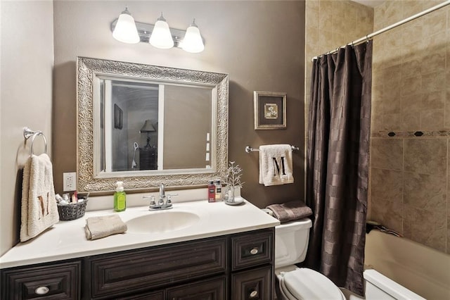 bathroom with vanity, toilet, and shower / tub combo