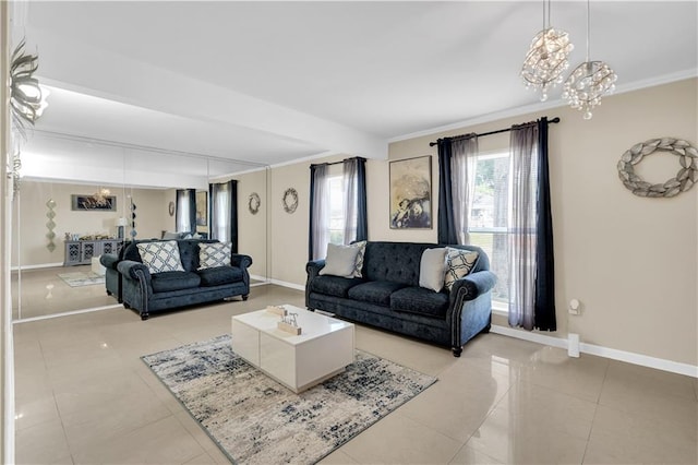 809 Oakwood Dr, Terrytown, LA 70056 - living area featuring crown molding, baseboards, a chandelier, and light tile patterned floors