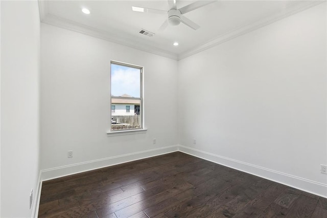 unfurnished room with dark wood-style flooring, a ceiling fan, visible vents, and ornamental molding
