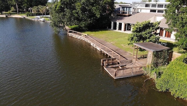 5640 Bancroft Dr, New Orleans, LA 70122 - dock with a water view and a yard