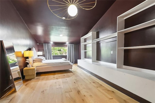 bedroom featuring hardwood / wood-style flooring
