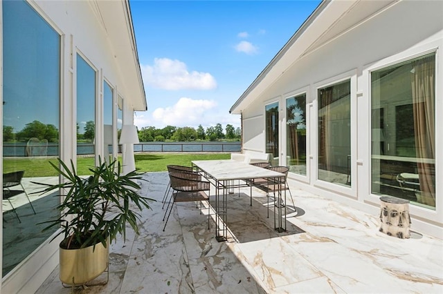 view of patio / terrace with french doors and outdoor dining area