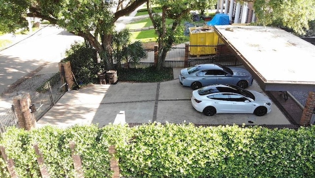5640 Bancroft Dr, New Orleans, LA 70122 - view of car parking featuring fence