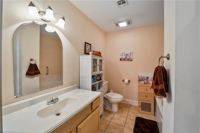bathroom with toilet, tile patterned floors, visible vents, and vanity