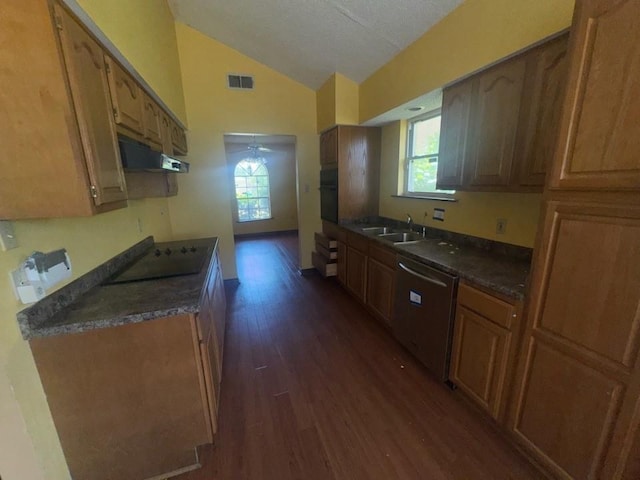 kitchen with visible vents, stainless steel dishwasher, vaulted ceiling, cooktop, and oven