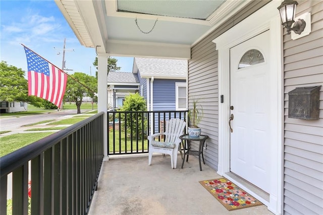 balcony featuring covered porch