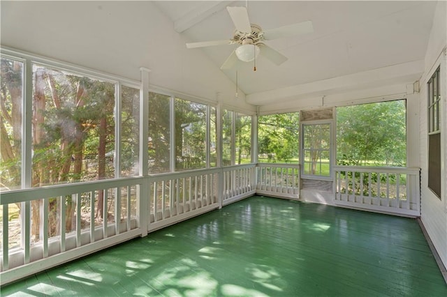328 E St, Mandeville, LA 70448 - unfurnished sunroom with plenty of natural light, a ceiling fan, and beam ceiling