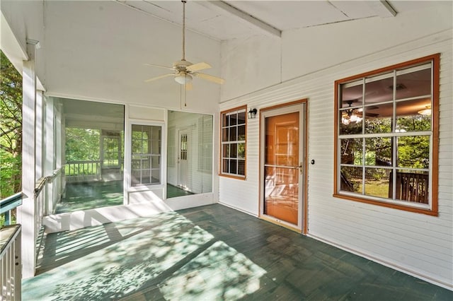 328 E St, Mandeville, LA 70448 - unfurnished sunroom featuring beamed ceiling and a ceiling fan