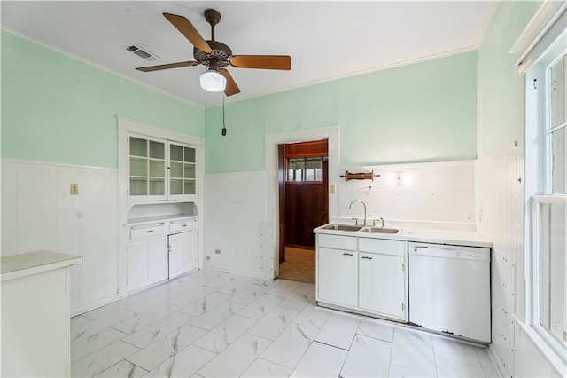 328 E St, Mandeville, LA 70448 - kitchen featuring ceiling fan, wainscoting, a sink, dishwasher, and visible vents
