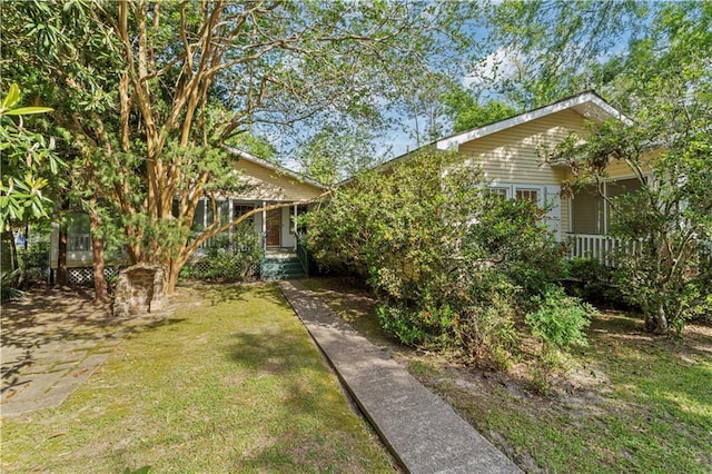 328 E St, Mandeville, LA 70448 - view of front of home featuring a front lawn