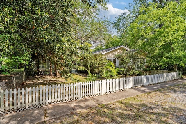 328 E St, Mandeville, LA 70448 - view of front of house with a fenced front yard
